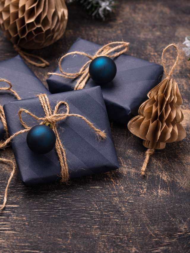 Christmas gift boxes in blue paper